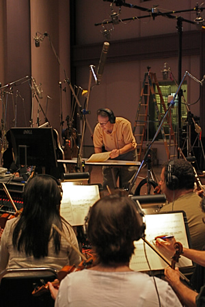 Lennie Moore conducting an orchestra at SkySound